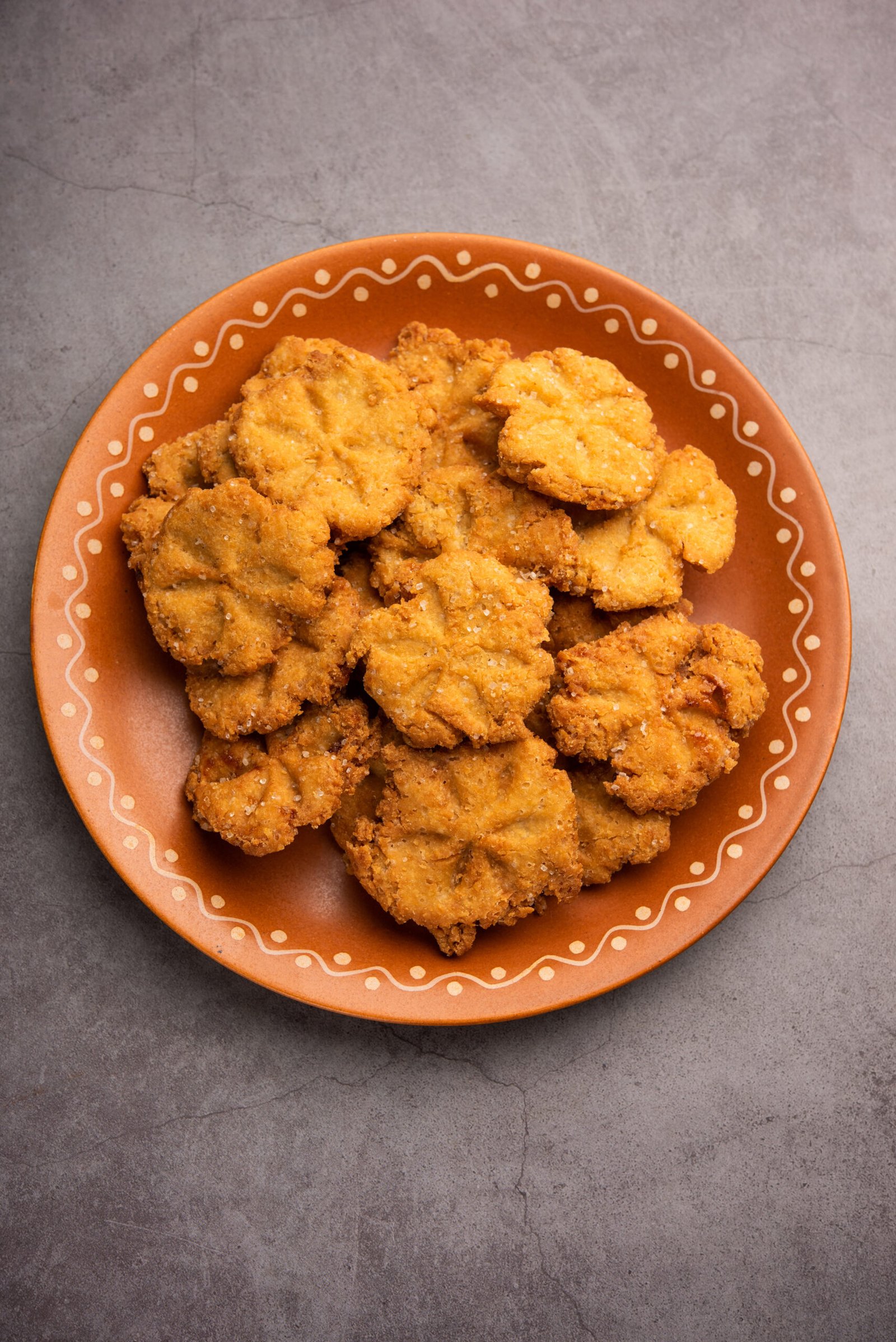 Thekua is an Indian sweet dish.popular in uttarpradesh, bihar and jharkhand.offering for the chhat festival.